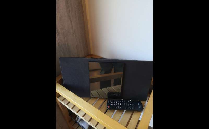 CDプレイヤー（Panasonic SC-HC1000、Bluetooth機能付き）です。